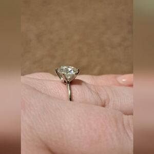 14k White Gold 3 carat round petite moissanite ring size 9.  Can be resized.